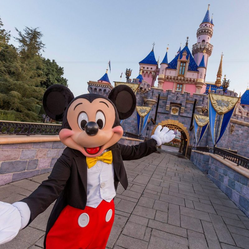Mickey Mouse poses in front of Sleeping Beauty’s Castle at Disneyland Park in Anaheim, Calif. Mickey Mouse and Sleeping Beauty’s Castle have long represented the feeling of joy and wonder in guests visiting Disneyland Park, inspiring everyone to explore the "Happiest Place on Earth” (Joshua Sudock/Disneyland Resort)